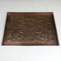 An Arts & Crafts Keswick School Copper Tray, of rectangular form with folded edge, decorated with