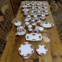 A Royal Albert 'Old Country Roses' pattern part Tea and Dinner Service, inc ; teapot, plates, jug,