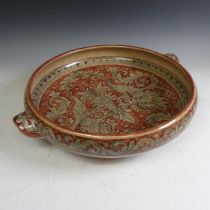 A large Italian Biagioli Gubbio pottery Dish, hand painted with peacocks and scrolling foliage, twin