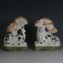 A pair of Rye Pottery figural Bookends, modelled as a Lion and Unicorn in the Staffordshire style,