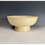 Keith Murray for Wedgwood; an Art Deco Footed Bowl, of green colour, facsimile signature and factory