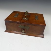 An Early 20th century Arts and Crafts oak metal bound smokers Box, with central carry handle and