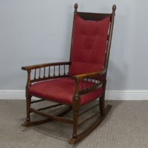 A William Birch for Liberty & Co, Arts and Crafts Rocking Chair, with turned supports, a ball and
