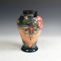 A Moorcroft pottery 'Oberon' pattern Vase, of baluster form, typical tube lined decoration,