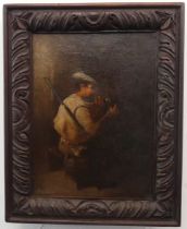 19th century Continental School, Huntsman with gun, smoking a pipe with a dog at his feet, oil on