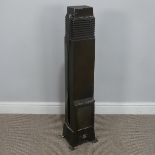 An Art Deco painted metal floor-standing gas Heater, with glass pane, W 22 cm x H 95 cm x D 22 cm.