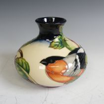 A Moorcroft 'Finches and Apples' pattern squat baluster Vase, on cream and basalt ground, dated