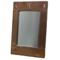 An Arts and Crafts Liberty & Co copper hall Mirror, rectangular form, stamped in low relief with