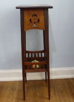 An Arts and Crafts mahogany and oak Torchere / Plant Stand, with tube lined Art Nouveau inspired