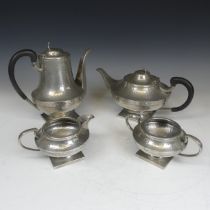 An Art Nouveau hammered four piece pewter Tea set, stamped to base(4)