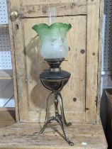 An late 19thC Oil Lamp, with acid etched glass shade, raised on copper and brass tripod stand,