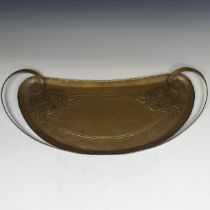 A Hugh Wallis Arts and Crafts two handled brass Tray, crescent shaped with stylised flowers and