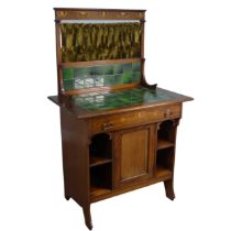 An unusual small Arts and Crafts mahogany Dresser / Washstand, with green tiles and stylised