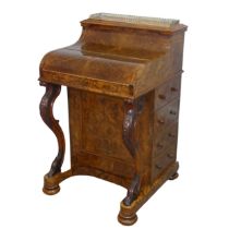 A Victorian burr walnut piano top Davenport Desk, the rectangular top with pierced brass three-