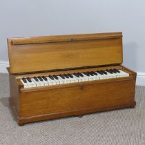 An early 20th century oak cased 'Dulcitone' portable Piano, made by 'Thomas Machell, Glasgow',