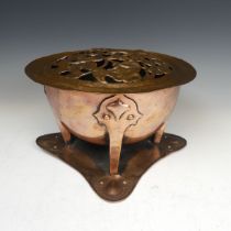 An Arts and Crafts copper Rose Bowl, circa 1900, removable top with pierced stylised vines and