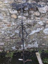 An Antique painted wrought iron Weather Vane, with painted metal running Fox surmount above four