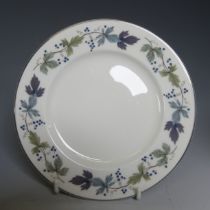 A Royal Doulton 'Burgundy' pattern part Dinner Service, comprising Dinner Plates, Tureens, etc. (a