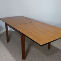 A mid-20thC teak extending folding Dining Table, a prototype designed by Martin Grierson,