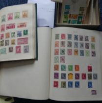 Stamps: A collection of stamps in two albums and loose including Canada, Ireland, etc. (2).