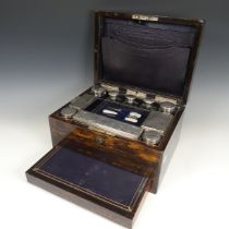 Victorian coromandel wood Vanity Box, the fitted interior with silver mounted glass jars, by