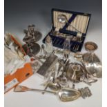 A quantity of Silver Plate, including chamber sticks, a pair of bottle coasters, flatware etc., (a