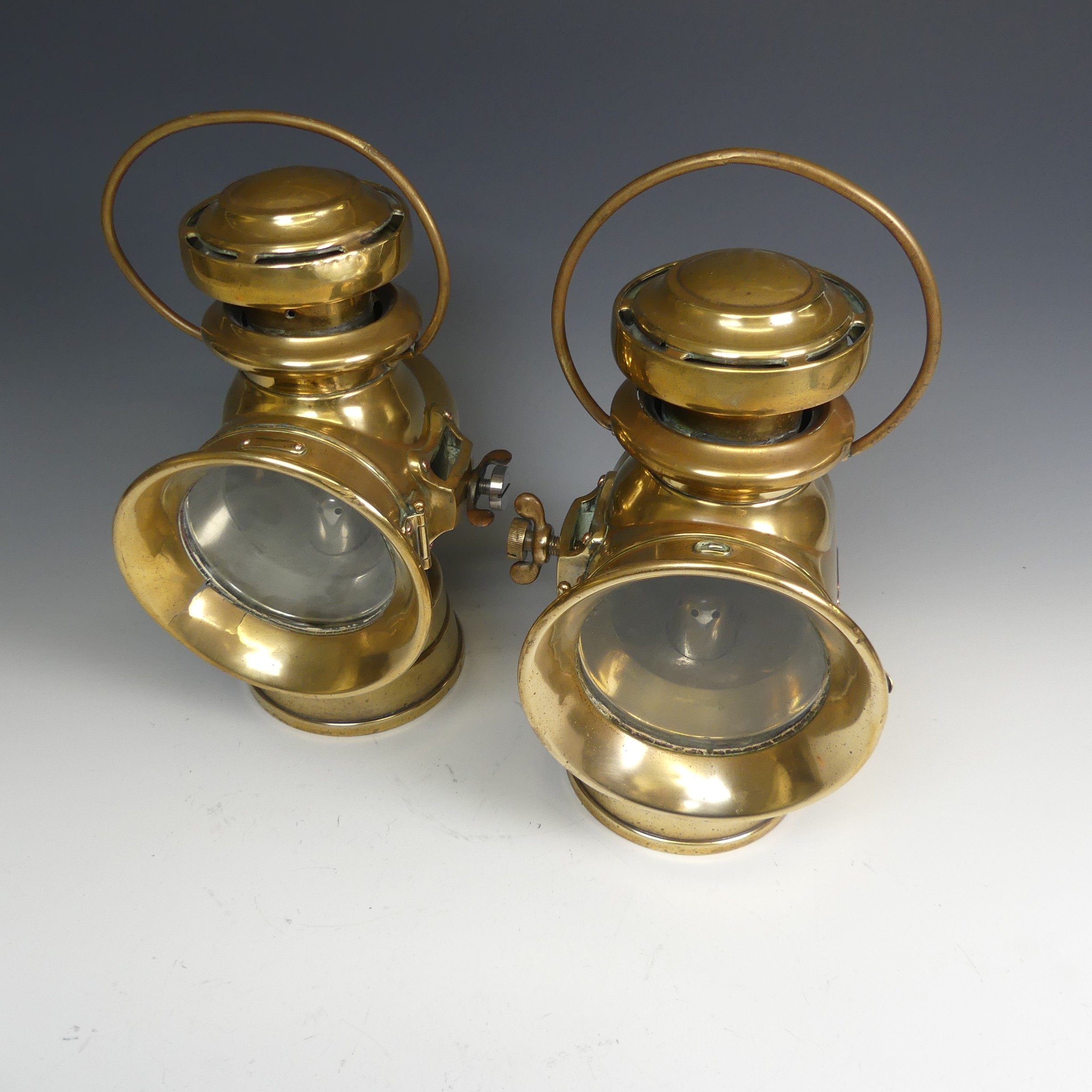 A pair of brass 'Lucas Burbury early motor car Lamps, with loop handles and screw attachments, H - Image 2 of 5