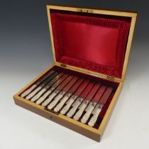 A cased set of twelve silver plated Dessert Knives and Forks, by Walker and Hall, with mother of