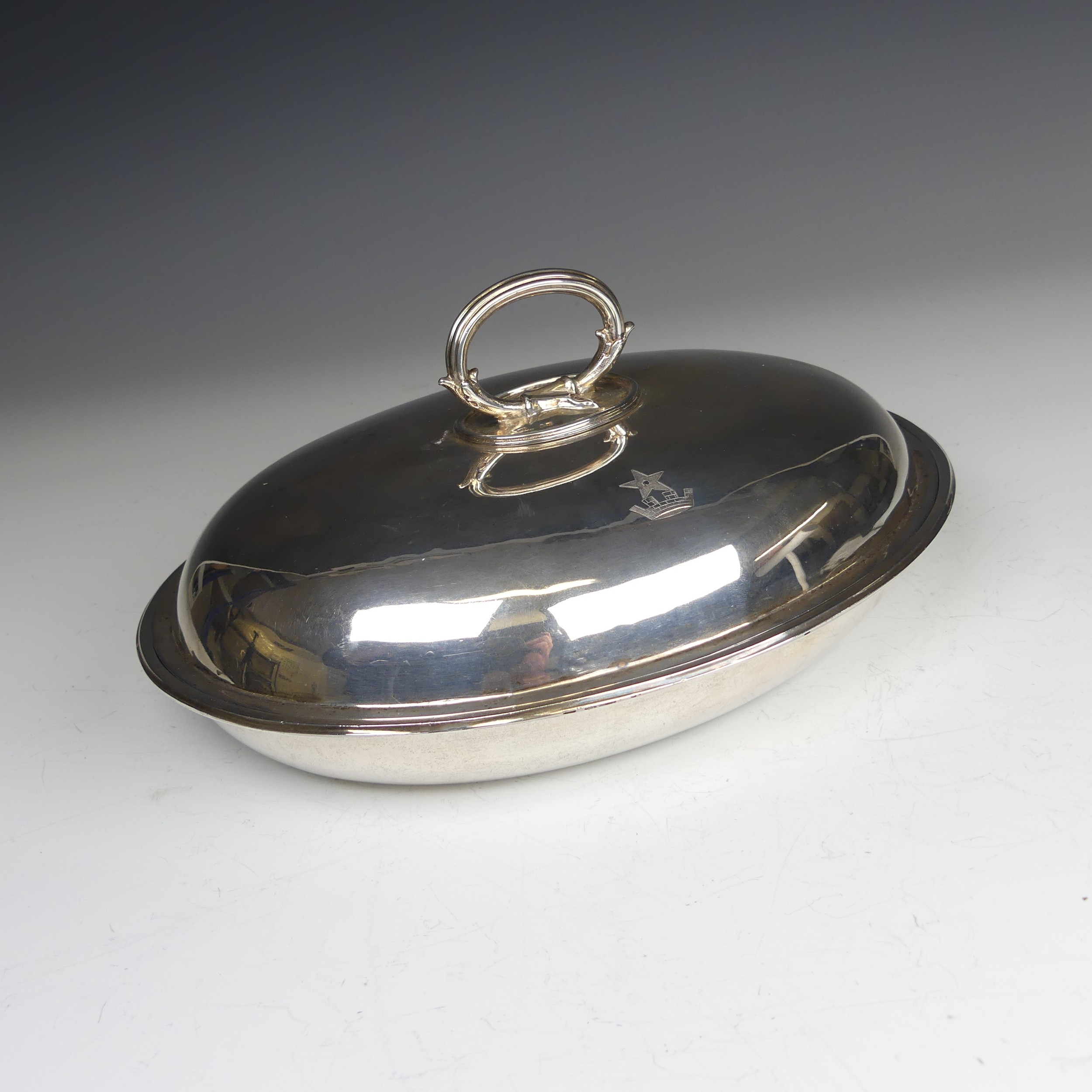 A Victorian oval silver Entrée Dish, hallmarked London 1883, with loop handle, crested with Peile - Image 2 of 9