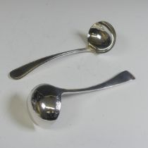 A pair of Victorian silver Sauce Ladles, by Elkington & Co., hallmarked Birmington, 1882, 18cm long,