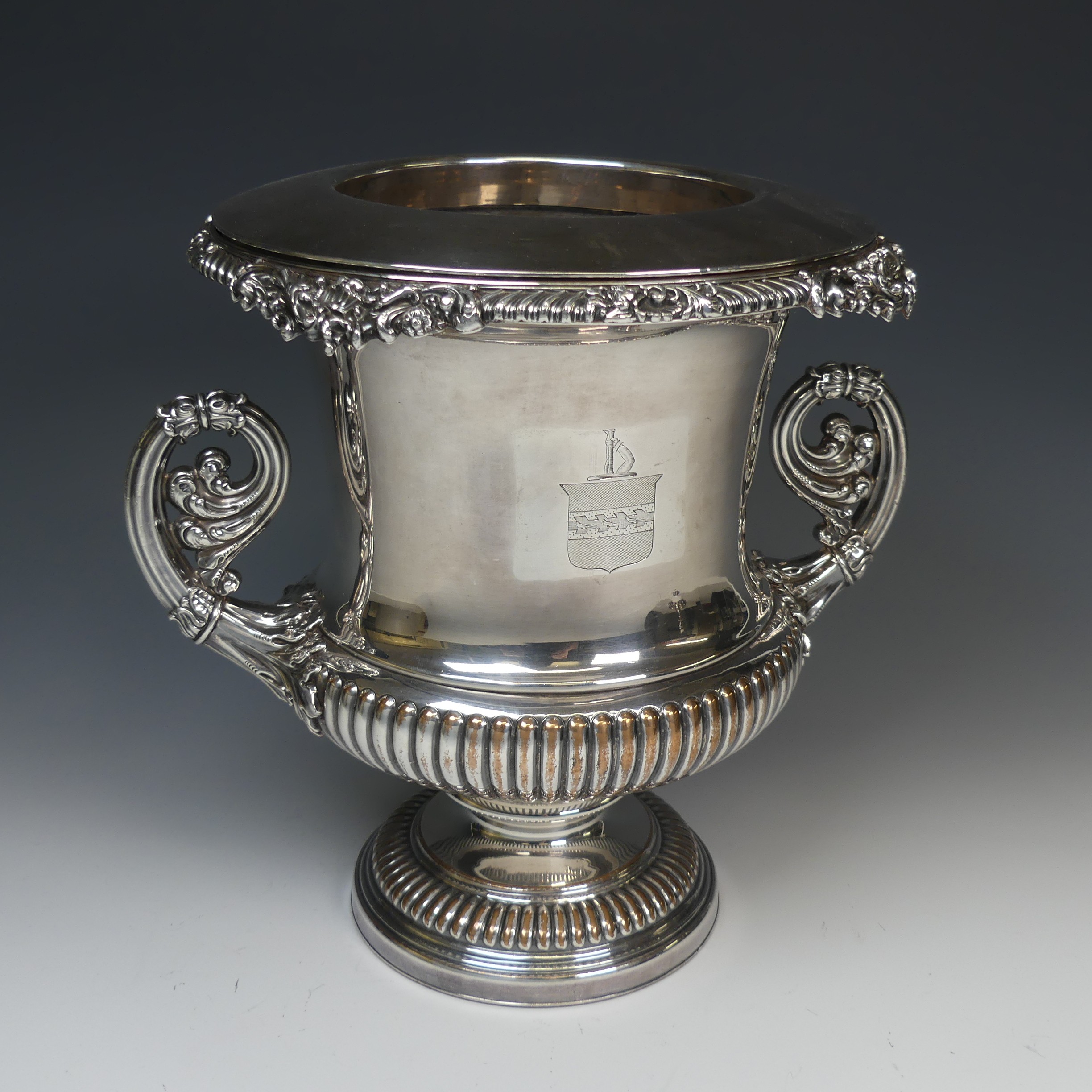 A silver plated Champagne Cooler, in the form of a campana urn, engraved with the Tolcher (Plymouth)