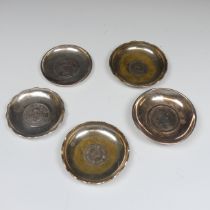 A Chinese silver Dish, by Lee Yee Hing, the centre inset with a one yen silver coin, 8cm diameter,