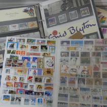 Stamps: An accumulation of Stamps in a plastic crate with GB decimal presentation packs and year