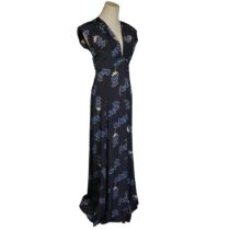 A vintage 1970s Ossie Clark maxi Dress, with navy blue ground decorated with cream and blue