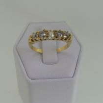 A five stone diamond Ring, old cut stones, approx total weight 0.4ct, mounted in 18ct yellow gold,