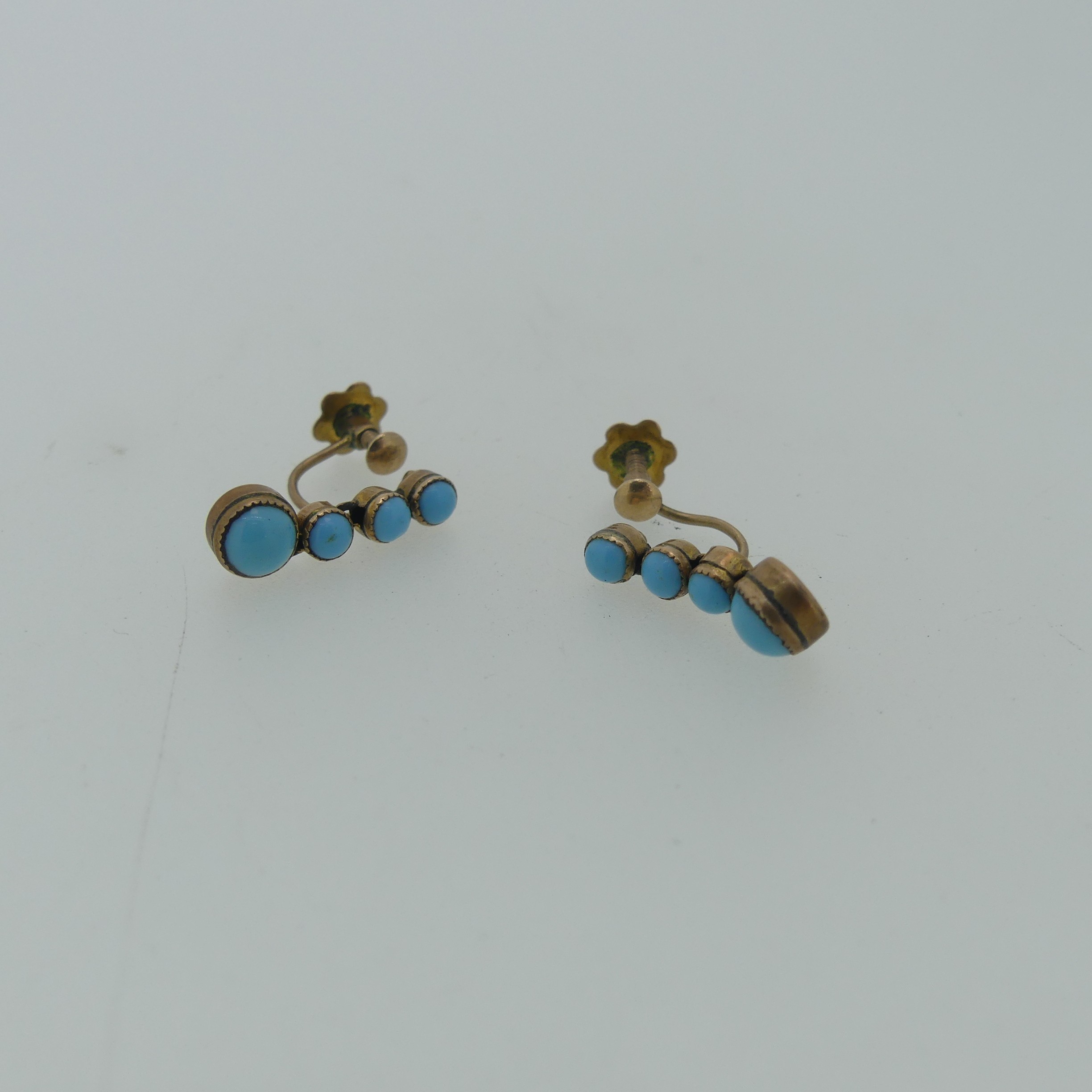 A pair of early 20thC turquoise Earrings, formed as drops of four cabochon stones, all mounted in - Image 4 of 6