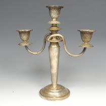 A Thai silver three light Candelabra, screw fitting urn shaped capitals on scroll arms, on a plain