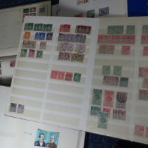 Stamps; A collection of various Stamps in six Albums, and some loose with mint GB and British Empire