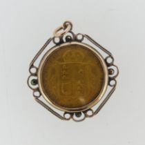 A Victorian gold Half Sovereign, dated 1892, with shield reverse, in unmarked pendant mount,