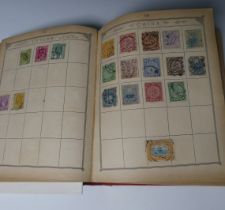 Stamps; An old time collection of stamps in a Lincoln album including China.