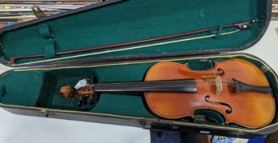 An early 20th Century Stradivarius copy Violin, with two-piece back, bears label “Copie de