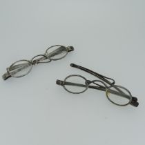 Two pairs of George III silver Spectacles, partially hallmarked only, one with damage to frame and