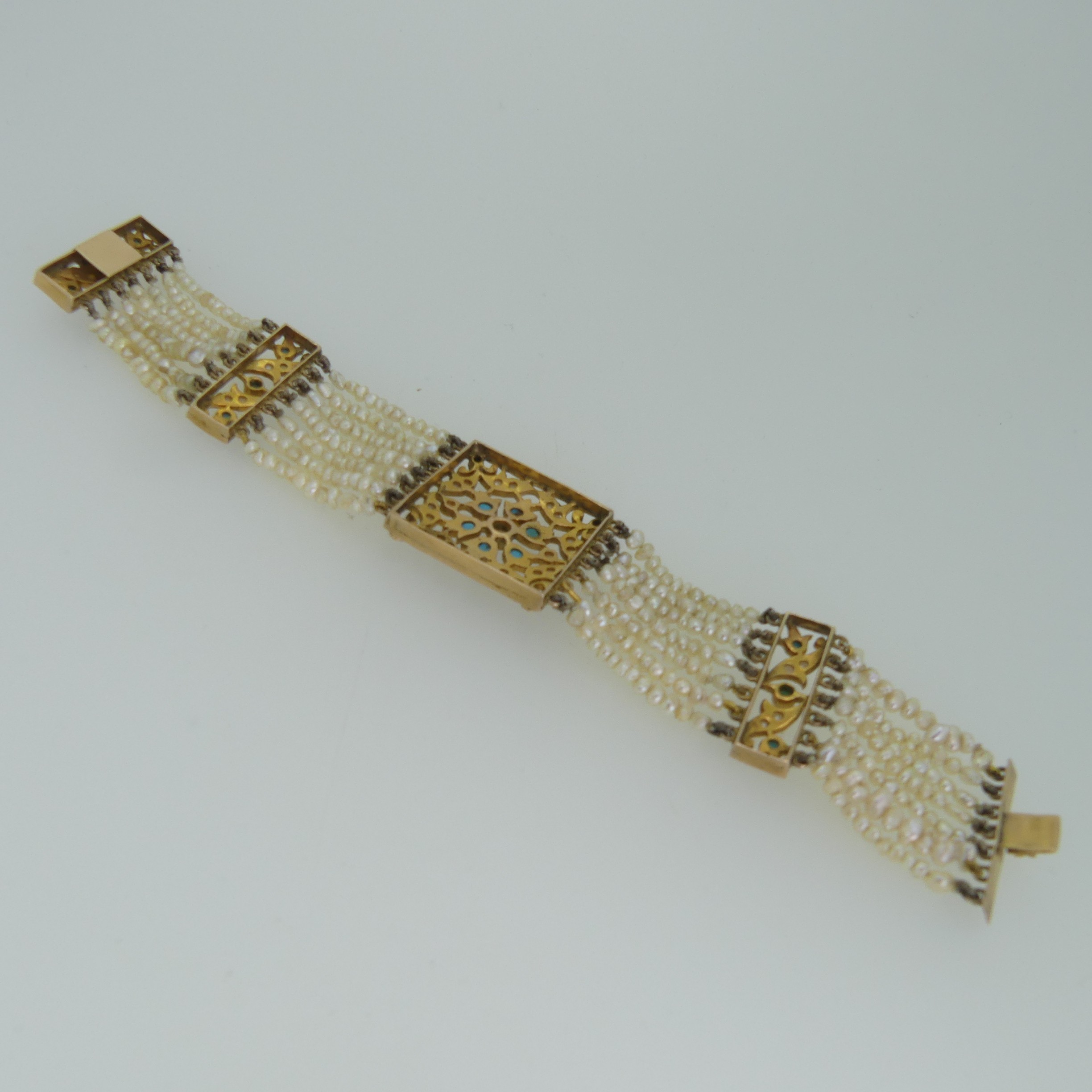 An antique multi-strand seed pearl Bracelet, in the Regency style with a central foliate pierced - Image 3 of 3