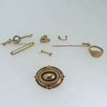 A 9ct gold Bar Brooch, the open circular centre set with alternate seed pearls and sapphires,