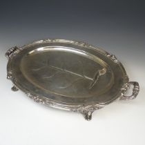 An Old Sheffield Plate water heated Meat Dish, of oval form with foliate rim, the centre with well