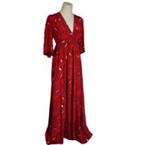 A vintage 1970s Ossie Clark maxi Dress, for Radley, of red colour with black and white decoration,