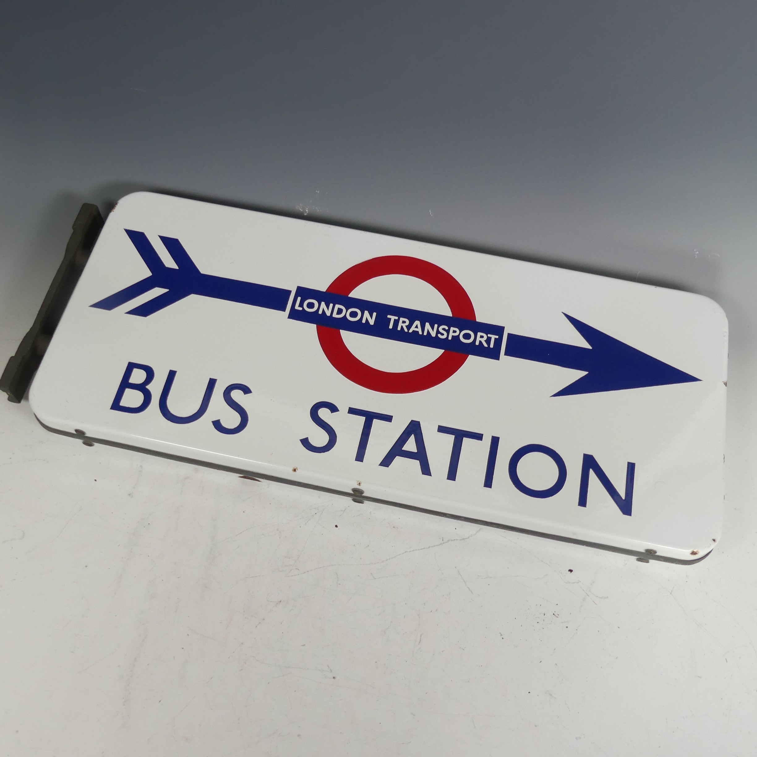London Transport; A double sided enamel Direction Arrow 'Bus Station' Sign, with bracket, very