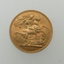 A George V gold Sovereign, dated 1913.