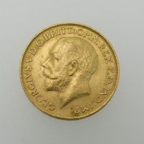 A George V gold Sovereign, dated 1913.