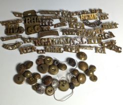 A collection of approximately 40 WW1 & WW2 Military shoulder Titles / Badges, inc ; REME, REA, RAMC,
